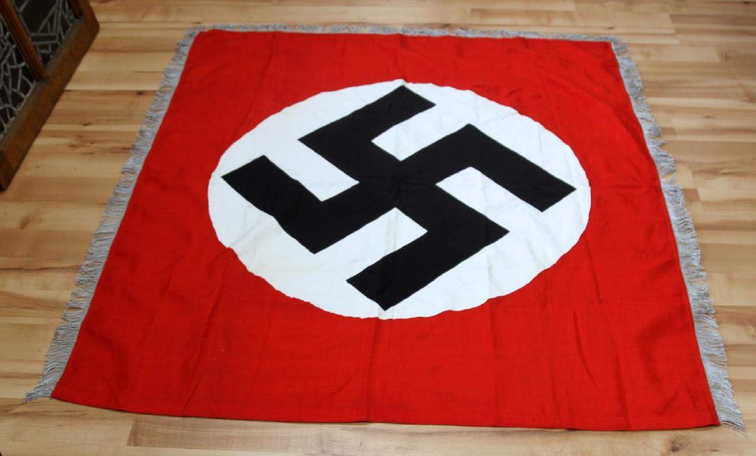 WWII GERMAN BULLION FRINGE NATIONAL FLAG BANNER: Has some small holes around the roundel, hardly detract, silver bullion thread border, measures 50 by 55 inches. RZM sticker lower right. F132