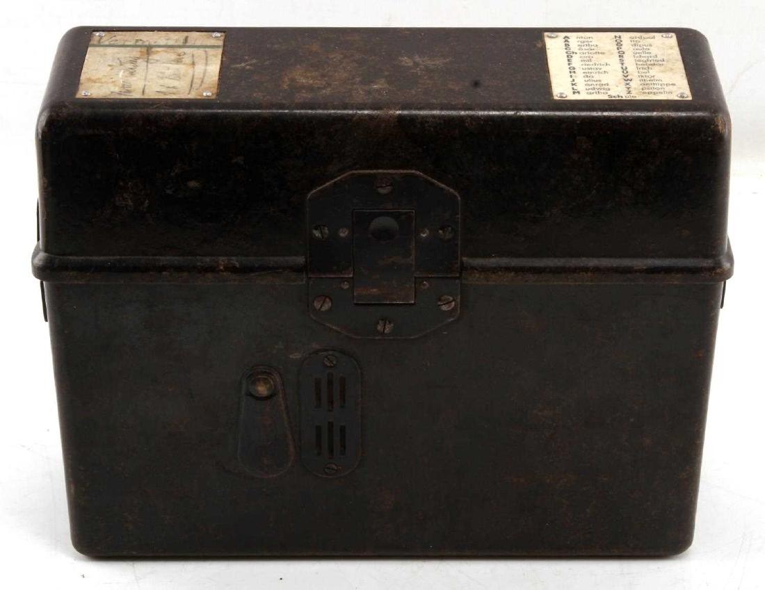 WWII GERMAN THIRD REICH ARMY FIELD TELEPHONE: German Army field telephone with black bakelite case. Includes German phonetic alphabet riveted on top. In very good condition overall, with minor wear to the outside. FE63
