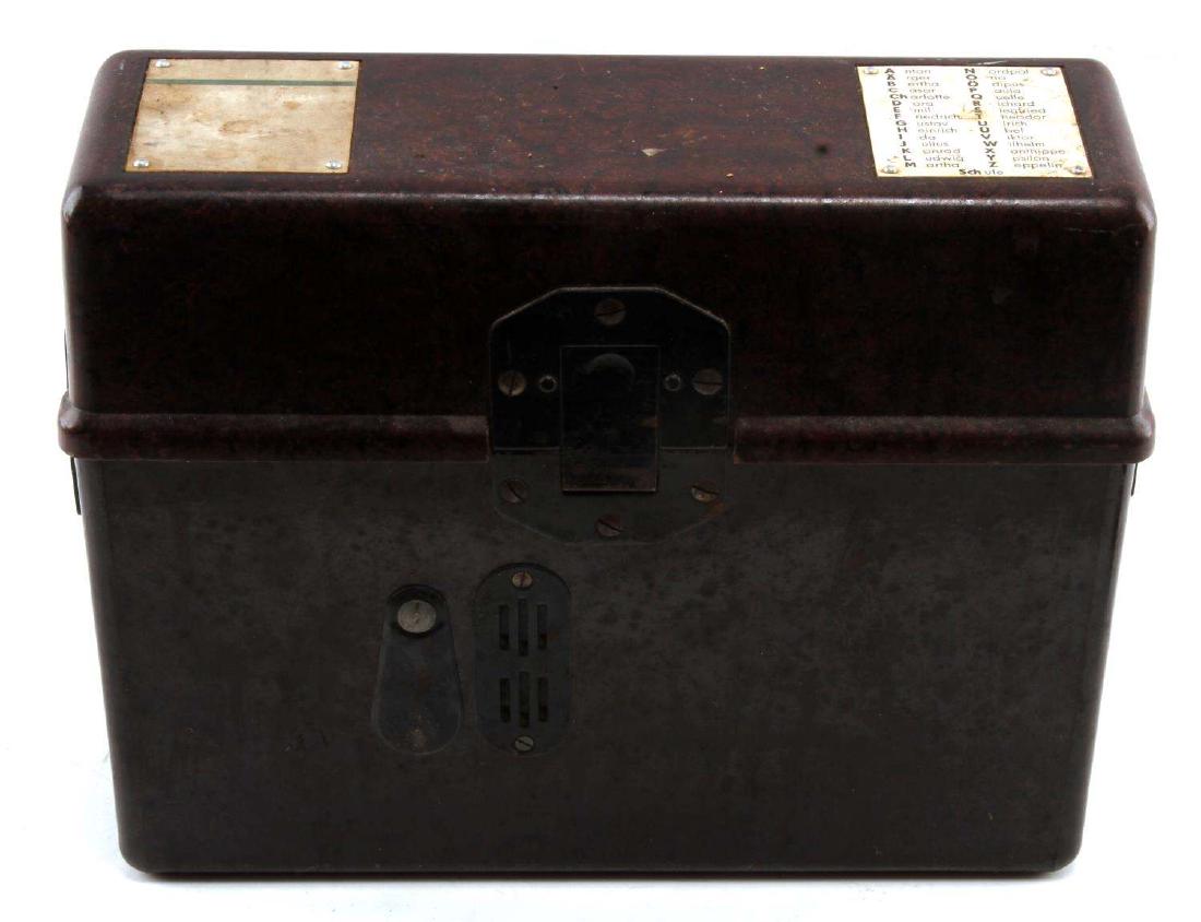 WWII GERMAN THIRD REICH ARMY FIELD TELEPHONE: German Army field telephone. Has dark brown bakelite case. Mix and Genest tag inside. In very good condition. Minor wear to the outside. FE73