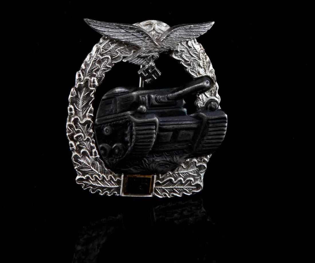WWII THIRD REICH PANZER ASSAULT BADGE 75 CLASS: Two piece construction. Unmarked reverse. Rear tapered broad pin with "C" clasp and 180 degree lie. In very good condition with some patina. Presumed reproduction.