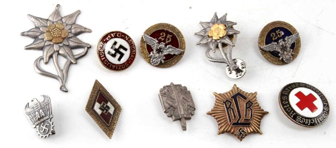 10 WWII GERMAN ASSORTED PIN & BADGE LOT NSDAP ETC: Lot of TEN (10). Hitlerjugend, NSDAP, Red Cross, and more. Some have maker's marks. All in very good condition. Unauthenticated. Sold "as is". This lot has a reserve.