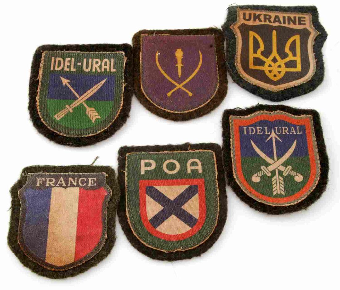 GERMAN WWII LOT OF 6 VOLUNTEER FIGHTER PATCHES POA: German WWII lot of 6 volunteer fighter patches. Includes France, Ukraine, POA, Idel-Ural (2), and one unknown. All in VG condition with minor soiling to their faces. Unauthenticated, sold as is. This 
