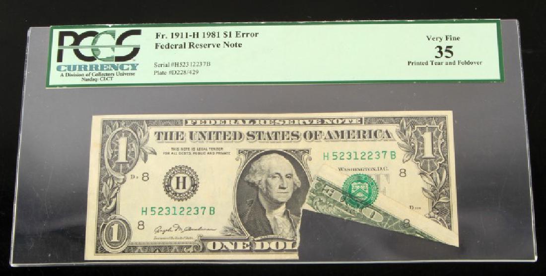 RARE OBSTRUCTED OVERPRINT ERROR $1.00 FRN PCGS VF: This is not a simple fold error, this is a certified obstructed printing of the Federal Reserve Seal and serial number. PCGS VF-35 Fr. 1911-H. Exceedingly rare. This lot has a reserve.