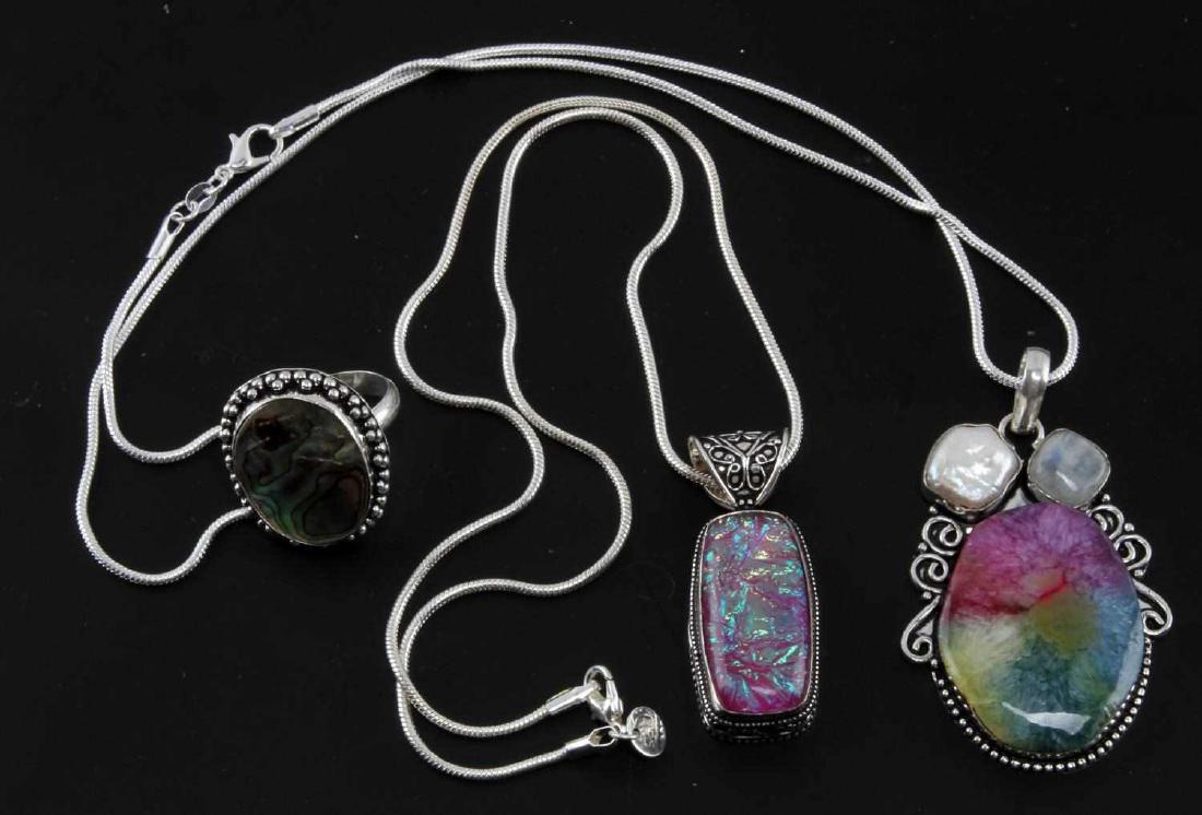 ABOLONE OPAL PEARL AND DRUZY AGATE JEWELRY LOT: Lot of 3 includes: 16Ct, size 8, Abolone shell mounted in .925 sterling silver ring and a 48Ct highly polished multi color Druzy Quartz pendant with pearl and moonstone accents mounted in .925 silver.