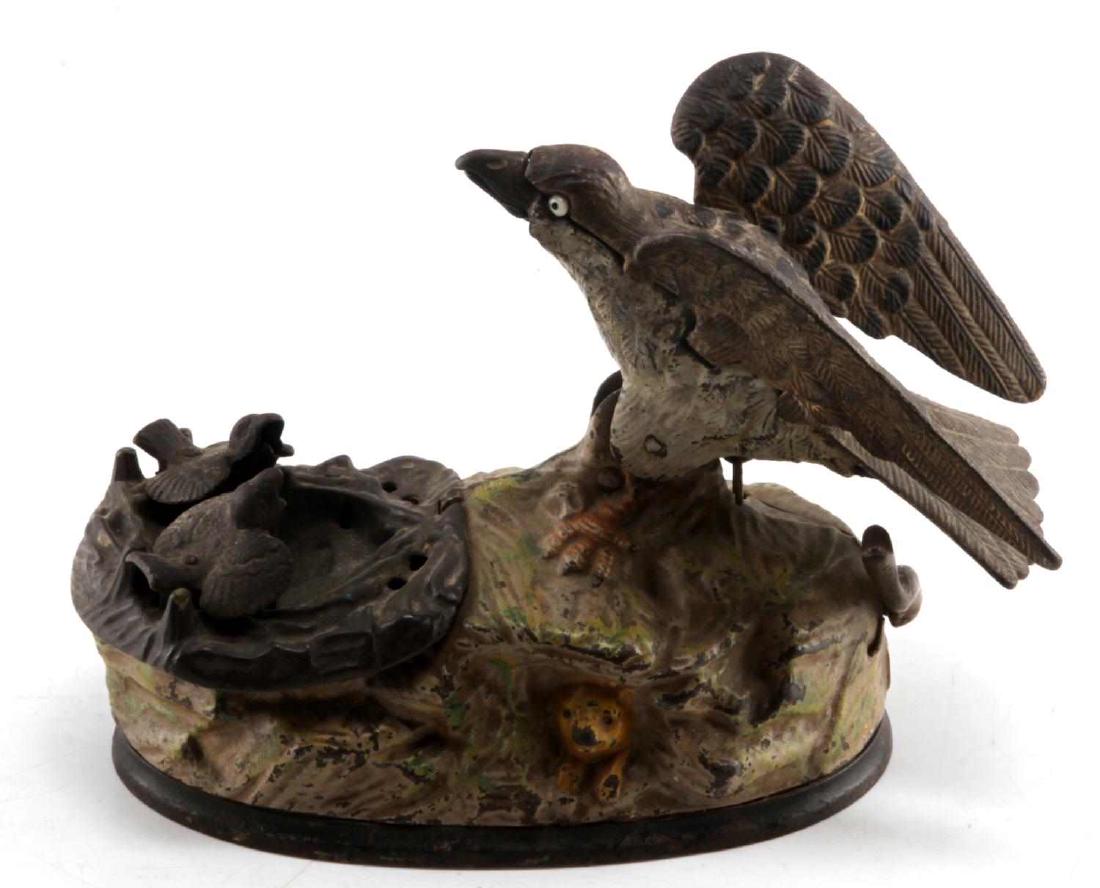 ANTIQUE MECHANICAL NESTING BIRD COIN BANK