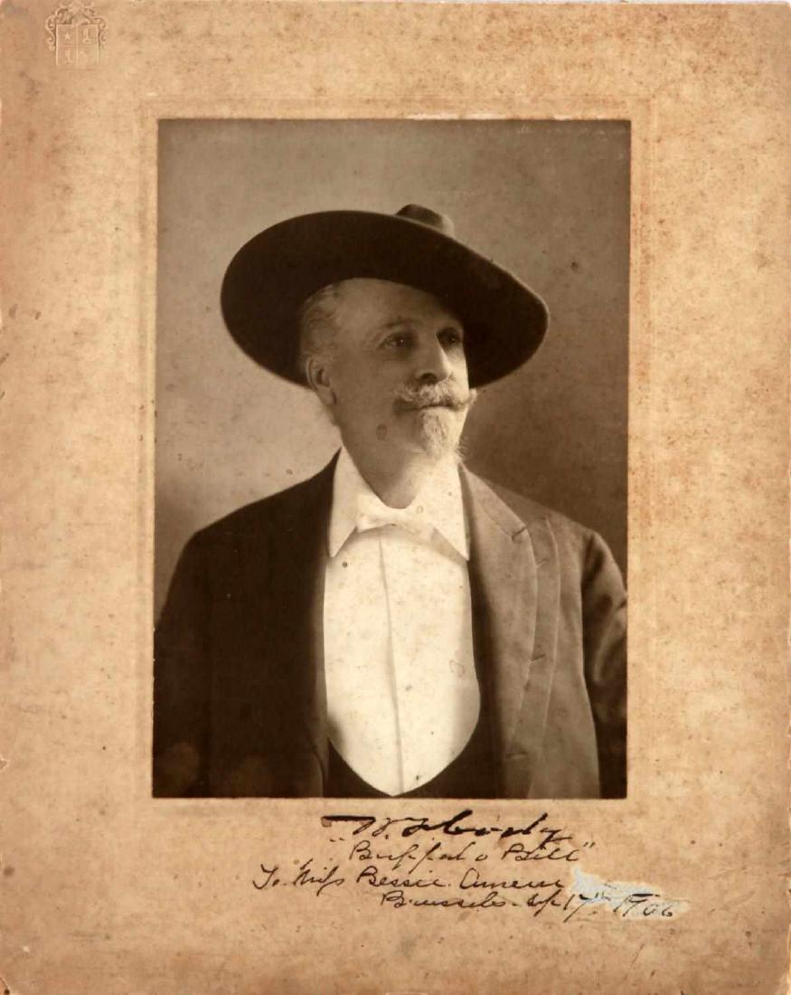 CABINET PHOTOGRAPH SIGNED BY BUFFALO BILL CODY: Measures 10.5 by 8.5 inches, "To Miss Bessie, Brussels" 1906 dated, deemed authentic. NMRM17