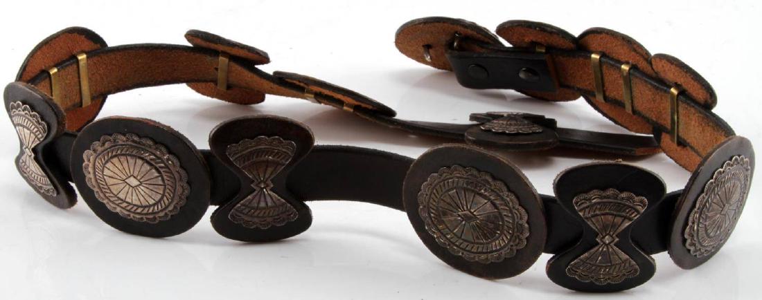 VTG TO ANTIQUE NATIVE AMERICAN STUDDED CONCHA BELT: VTG to Antique Native American Style Studded belt with buckle , 14 total Conchas' are present on the belt. Belt measures 37 inches in full length. Item is in good condition.