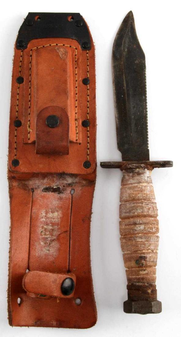 VIETNAM ERA ONTARIO 10-76 PILOT SURVIVAL KNIFE: Vietnam Era Ontario 10-76 Pilot's Survival Knife and Sheath. Corrosion present on knife Handle and wear present on blade, sheath in good condition UEW88
