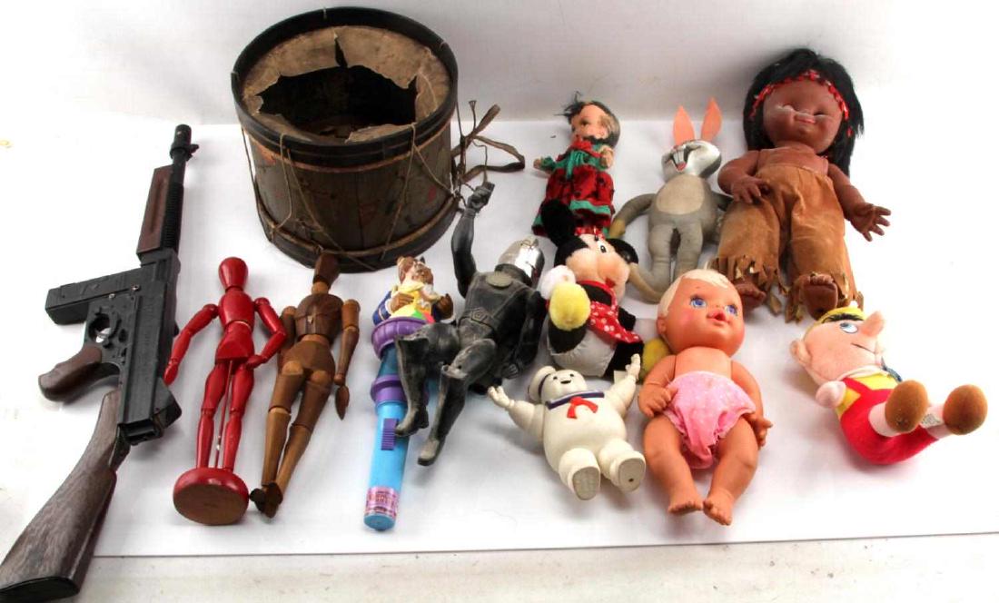 VINTAGE TOY LOT MATTEL TOMMY BURST DOLLS & MORE: Lot contains 13 toys in total and includes the Mattel Tommy-Burst gun in good and working condition, a 9"x7" boy scout drum (needs repair), a Battle Star Galactica trooper, Disney dolls, and more. Toy