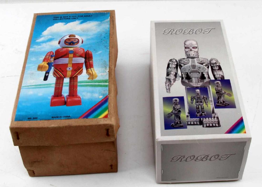 TIN TOY WIND UP ROBOT LOT TERMINATOR & SPACE: Boxed as new, modern homage toys. Each stands 9 inches.