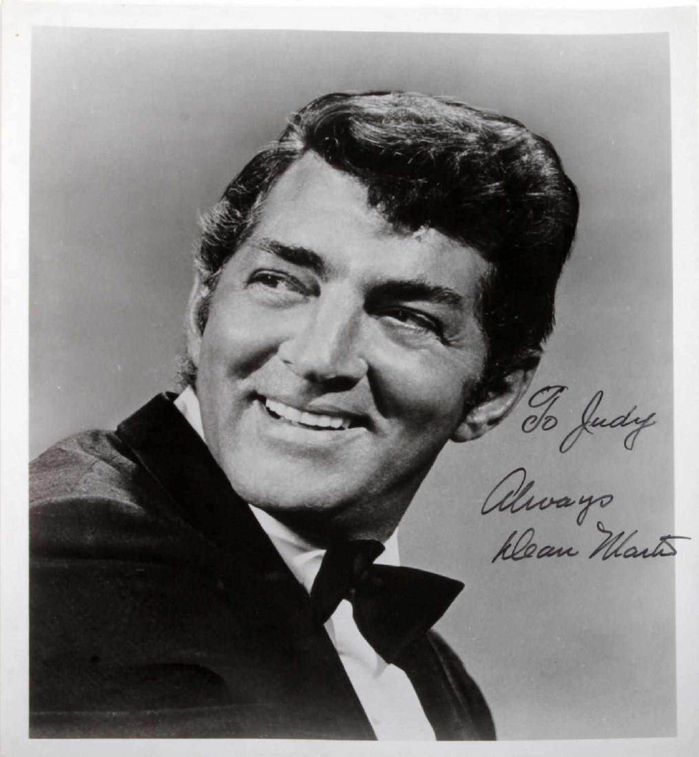 DEAN MARTIN HOLLYWOOD CELEBRITY 8X10 AUTOGRAPH: Dean Martin autographed 8x10 inch black & white photo. Signed in black ink "To Judy - Always, Dean Martin". Some photo album glue line marks to back. Appears to be authentic. No COA.