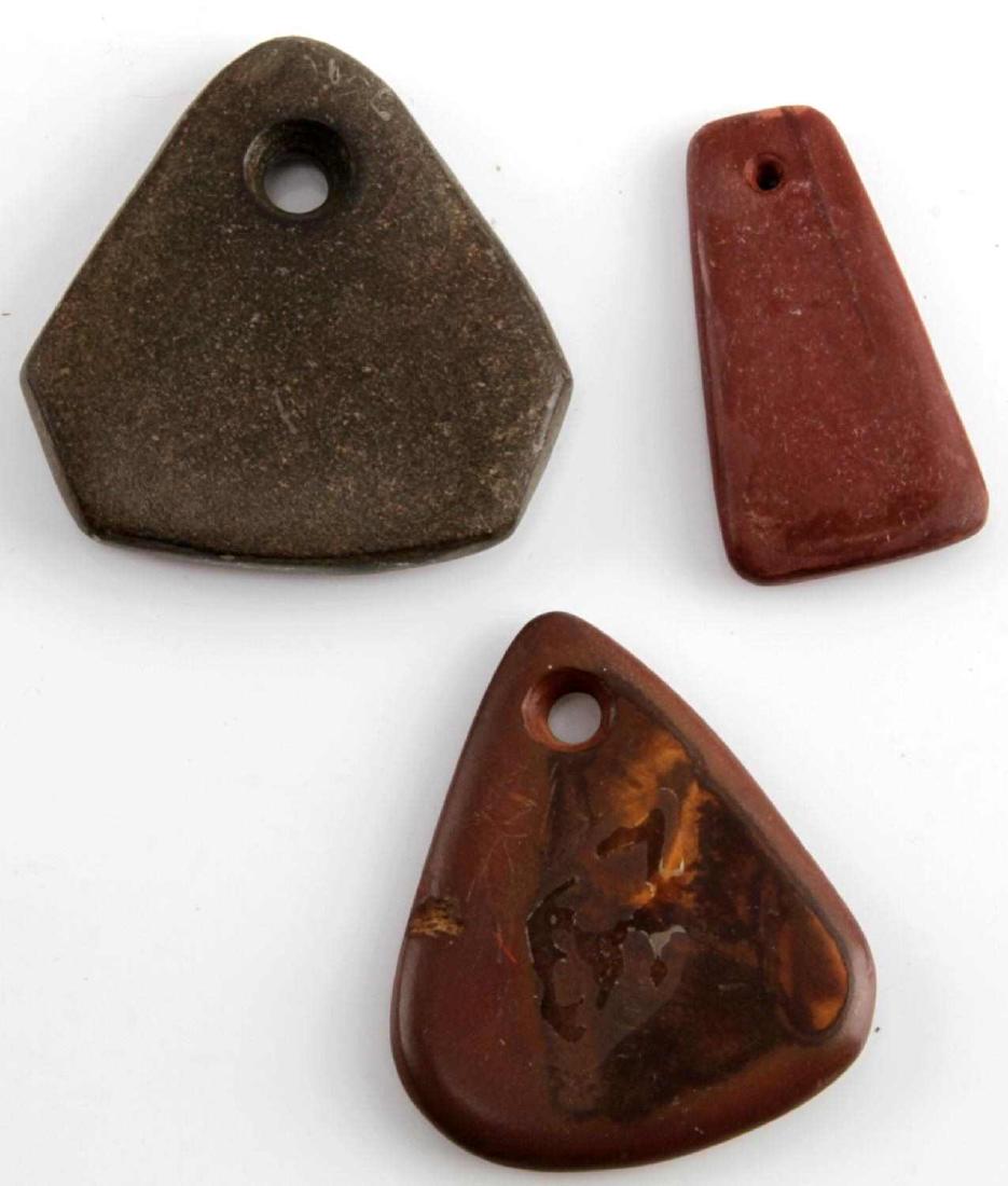 3 NATIVE AMERICAN WOODLAND SLATE GORGET ARROWHEAD: These are nice small 2 and 1/4" to 2" geometric gorgets each with 1 conically drilled hole. They are made of black, brown and red slate and have good polish. Very good condition with small chips and s