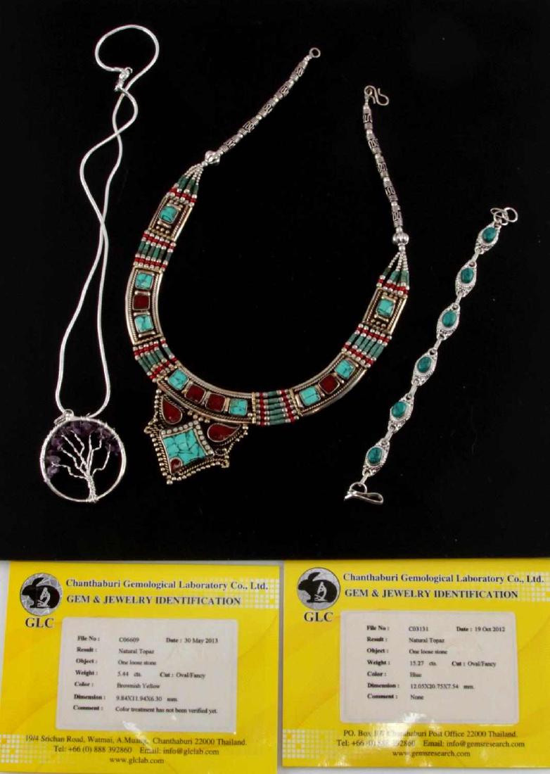 LOT OF MIXED GEMSTONE PIECES TURQUOISE TOPAZ AMETH: Lot includes: two loose topaz stones with certificate card, one amethyst tree pendant, one turquoise bracelet, and one turquoise and coral necklace. Does not test for silver. Good condition. Cataloger
