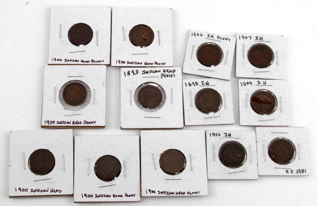 US INDIAN HEAD PENNY LOT OF 13 IN 2X2 HOLDERS: Lot of 13 Indian Head Pennies in 2x2s. One 1889, one 1890, one 1893, one 1895, five 1900s, one 1902, one 1906, one 1907, and one 1909. Most are in high fine condition, two of the 1900s are consistent 