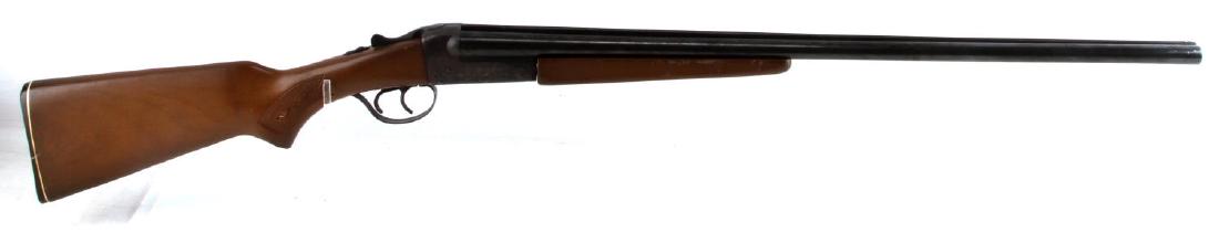 STEVENS MODEL 311 DOUBLE BARREL 20 GA SHOTGUN: Stevens Model 311 Series H double-barrel shotgun by Savage Arms. In good condition. Has some surface corrosion. Forestock is slightly loose. Minor scuffing on wood surfaces and the metal bluing is som