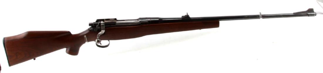 WINCHESTER M1917 SPORTER BOLT ACTION RIFLE .30 06: Sporterized bolt action rifle in .30-06 caliber. Blued steel retains 60%, U.S. Model of 1917 Winchester and serial no. marked to chamber, scope is absent, wood stock is good, flaming grenade and other