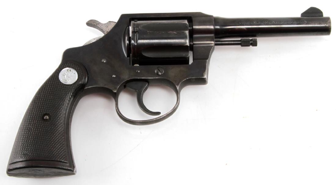 COLT POLICE POSITIVE .38 SPECIAL 6 SHOT REVOLVER: 1953 production. Blued steel retains most of its finish, clear markings to left and rise of of barrel and frame, Colt bakelite grips, very good bright bore, serial no. to interior frame and cylinder a