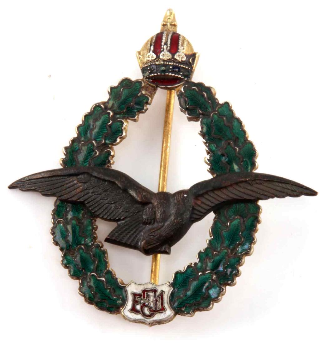 WWI AUSTRO HUNGARIAN IMPERIAL AVIATION PILOT BADGE: Pilot badge of the Austro-Hungarian Empire from WWI. Wide gold wreath type marked 'J Zimbler. Wein VII'. In very good condition. Unauthenticated/Sold 'as is' This lot has a reserve.