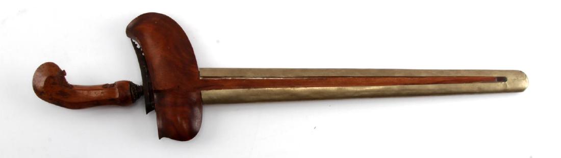 VINTAGE INDONESIAN KRIS DRESS FIGHTING KNIFE: Indonesian kris knife with a brass-wrapped wooden scabbard and flame blade. Measures 19 1/2 inches overall in scabbard. G3