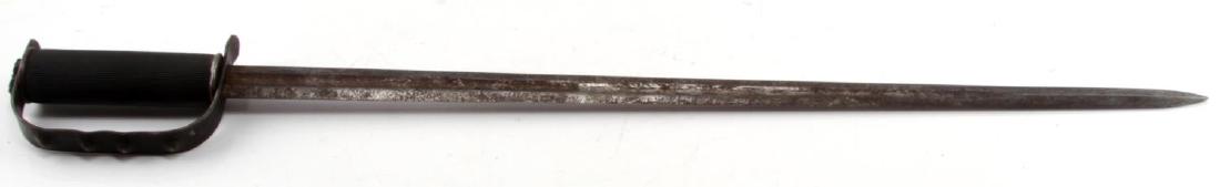 WWII US OSS DROP SWORD TRENCH FIGHTING KNIFE: OSS trench drop sword with a long blade made out of a surplus army sword. Has a rubber hose grip and four-raised knuckle duster guard. In very good condition. Measures 27 inches in length overall. MEW