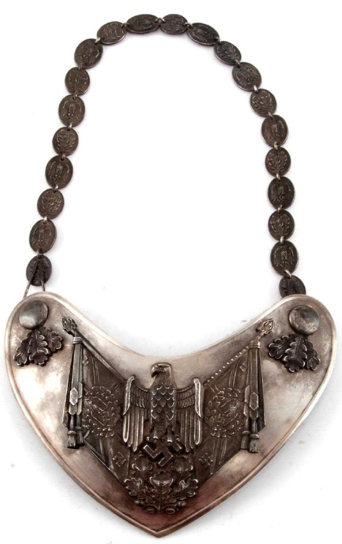 WWII GERMAN 3RD REICH ARMY STANDARD BEARER GORGET: German WWII Army standard bearer's gorget with chain. Maker Aurich Dresden with forest green backing. Chain has round center link. High detailed eagle with flags. In very good condition. This lot has