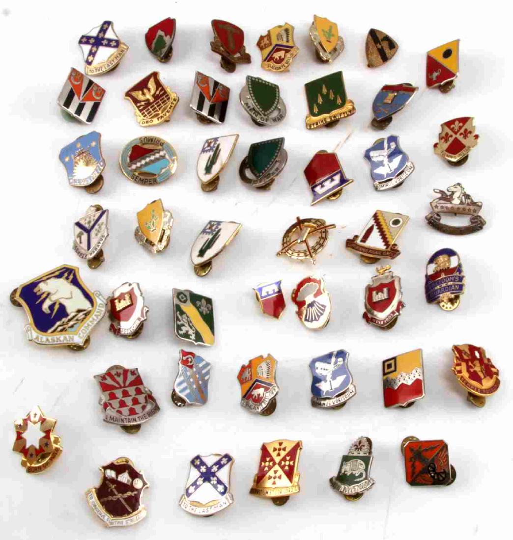 LOT OF US MILITARY DISTINCTIVE UNIT INSIGNIA PINS: Lot of 59 misc US military DUI pins. Some may have enamel loss or other minor condition issues. Lot includes vintage 164th Infantry, Alaskan Command, 238th Cavalry, 83rd Field Artillery, 18th Support 
