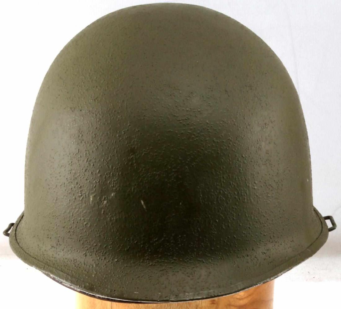 US WWII M1 SWIVEL BALE HELMET WITH ROTC LINER: Repainted steel shell marked '24FA' with 'S' underneath. Swivel bale. Cracked Firestone ROTC white liner with strong oxidation to metal fixtures. VG condition.
