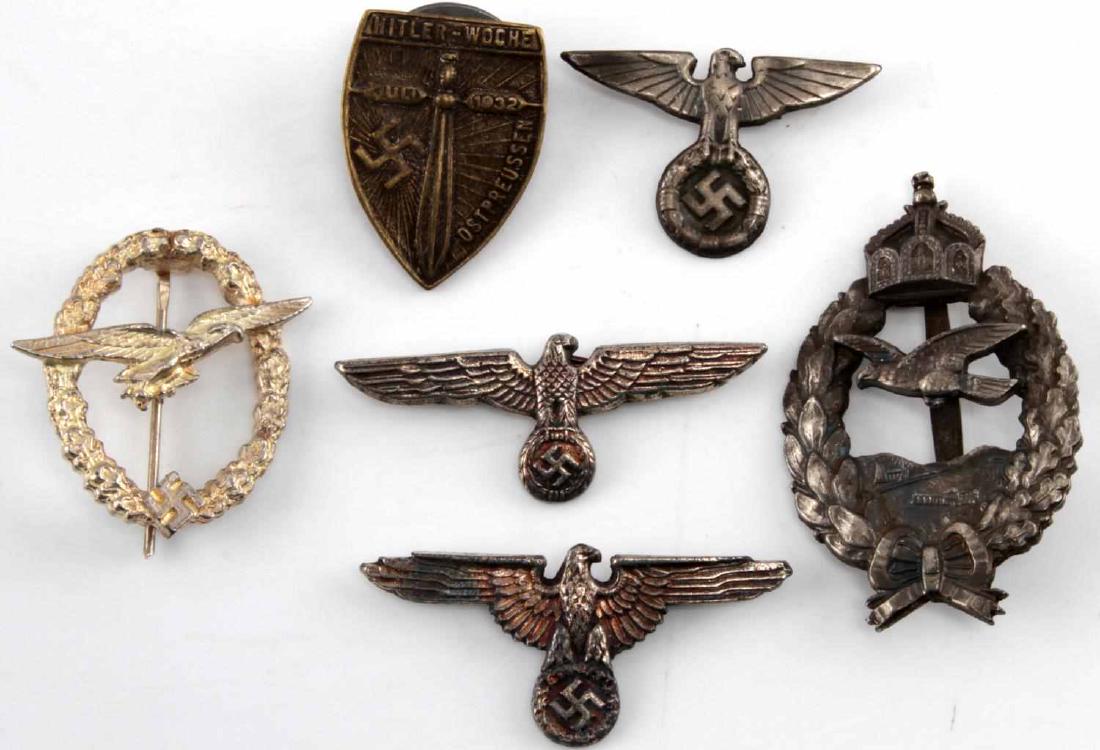 WWI IMPERIAL GERMAN WWII 3RD REICH BADGE LOT: Lot contains six badges. One is a retired WWI pilot badge, three are Third Reich hat badges, a Luftwaffe glider pilot badge, and a 'Hitler-Woche Ostpreussen Juli 1932' badge. All are in good condition