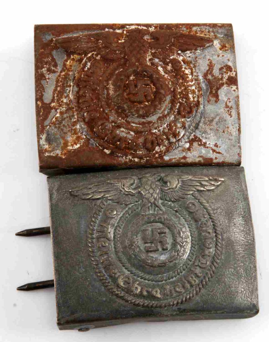 WWII GERMAN THIRD REICH SS BELT BUCKLE LOT OF 2: Buckles have the Waffen SS motto "Meine Ehre Heisst Treue!" One buckle is marked "A A&S" and has SS tag attached. Other buckle is RZM stamped 155/43 on the reverse and is also stamped with SS runes. H