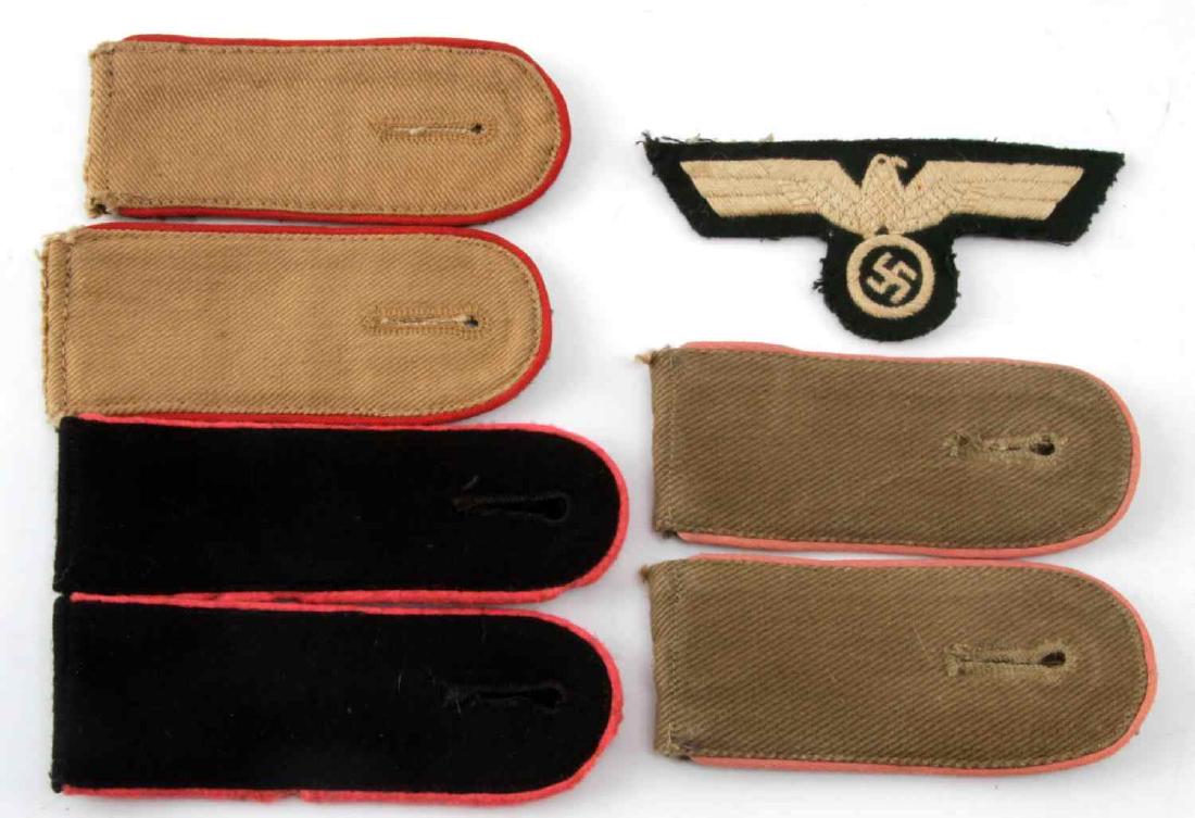 WWII THIRD REICH LOT OF SS & ARMY SHOULDER STRAPS: German Waffen SS and Army tropical enlisted man shoulder boards. Includes a pair of EM Waffen SS Panzer shoulder boards. The next two pair are army Luftwaffe Panzer and Artillery EM shoulder boards So