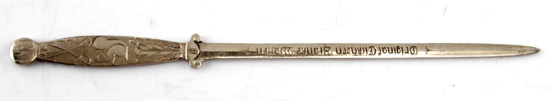 WWII GERMAN THIRD REICH EICKHORN SS LETTER OPENER: Over the shoulder Squirrel Eickhorn trademark. Both sides of the blade are etched "Original Eickhorn Blanke Waffen". One side of the hilt has raised SS runes and the other side a raised swastika. This