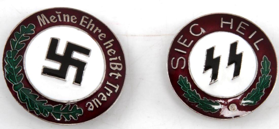 WWII GERMAN THIRD REICH SS NSDAP LAPEL PIN BADGES: Lot contains two lapel pins. One has 'Sieg Heil' written around SS sig runes. It measures 3.5 cm in diameter. The other has 'Meine Ehre Heist Treue' on it and measures 4 cm in diameter. Both are RZM m