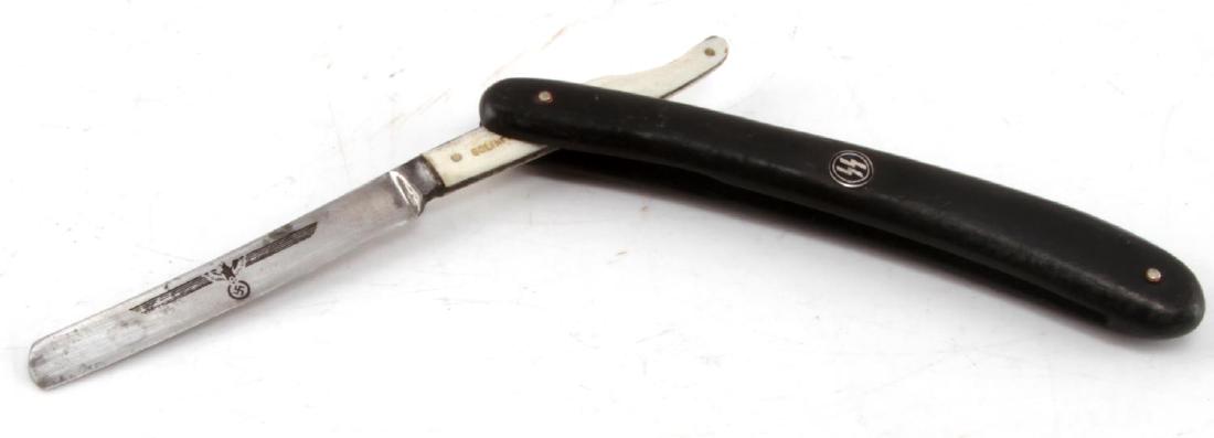 WWII GERMAN THIRD REICH WAFFEN SS STRAIGHT RAZOR: Straight razor with a Solingen blade and Reichsadler on the blade, as well as sig runes on the handle. In very good condition. Unauthenticated/Sold 'as is' This lot has a reserve.