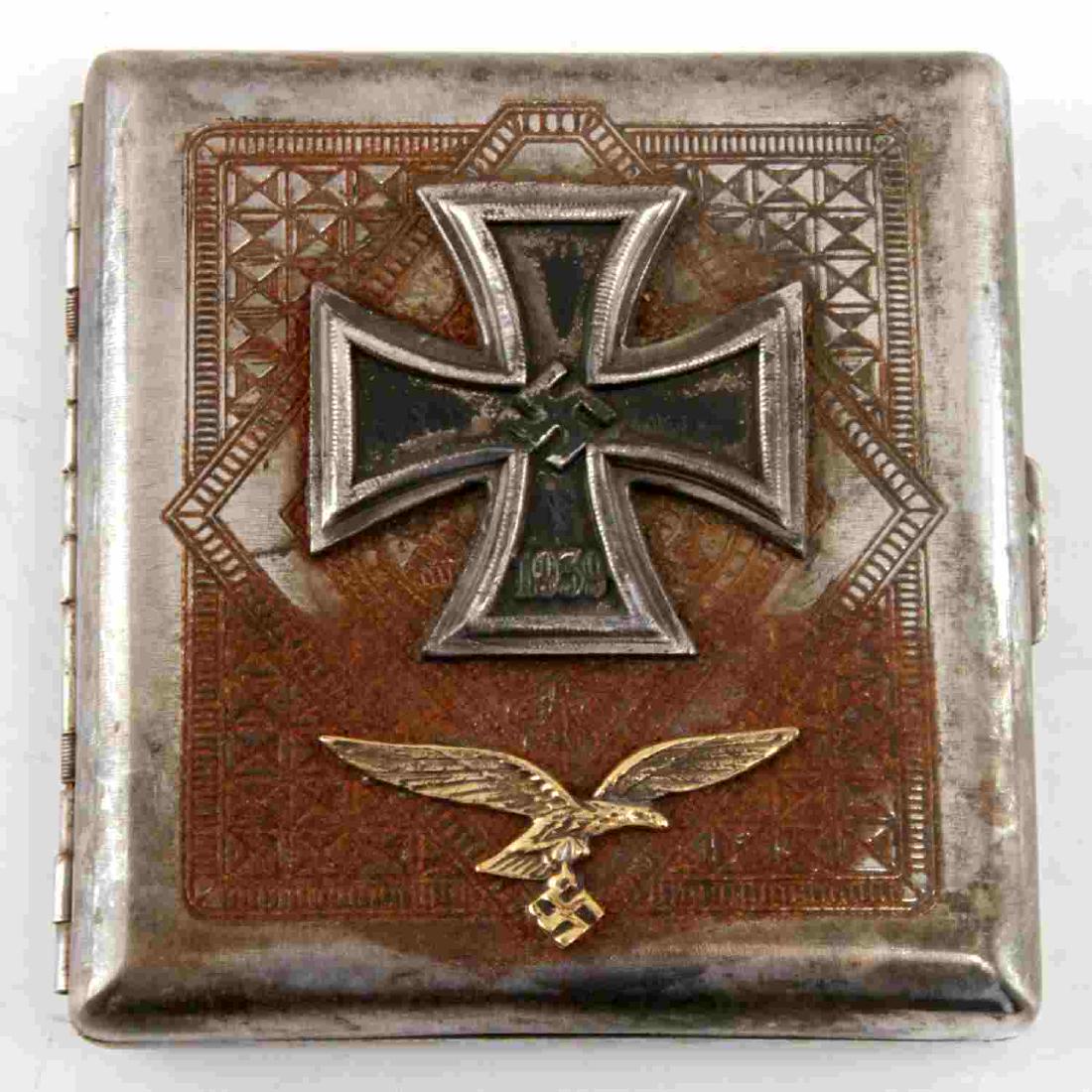 WWII GERMAN LUFTWAFFE IRON CROSS CIGARETTE CASE: Luftwaffe pilot Iron Cross winner cigarette case. Has an RZM mark on the inside holder. Minor corrosion on the inside. Unauthenticated/Sold 'as is' This lot has a reserve.