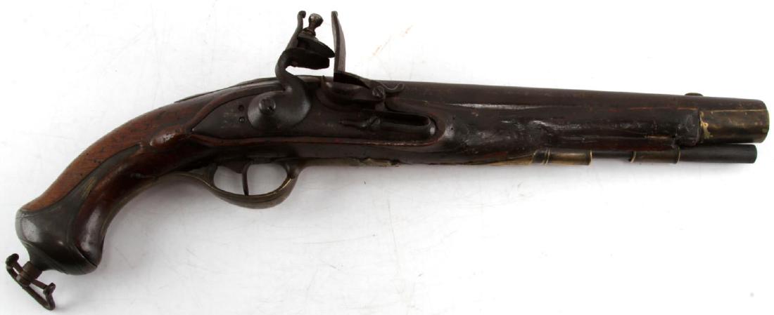 CONTINENTAL FLINTLOCK HORSE PISTOL .72 CALIBER: Crossed swords emblem to top of 10.75 inch barrel, oxidized but clear bore, Fleur de lis emblem to left side barrel, along with indented mark (illegible.) Brass fittings. Some pitting to barrel at bre