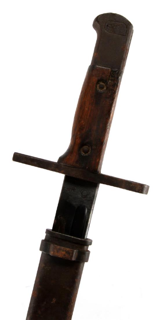 LATE JAPANESE TYPE 30 ARISAKA BAYONET W SCABBARD: Late War WWII era Japanese Type 30 Arisaka Bayonet with original scabbard. Made by Toyoda Jido Shokki Seisakusho (Toyoda Automatic Loom Works) under Nagoya Arsenal supervision - rectangular pommel wit