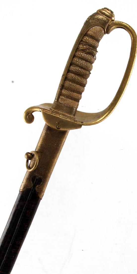 RUSSO NIPPON WAR JAPANESE INFANTRY SABER: Near excellent blade with leather complete scabbard, some minor wire loss to Ray skin grip. Very nice example. EW5