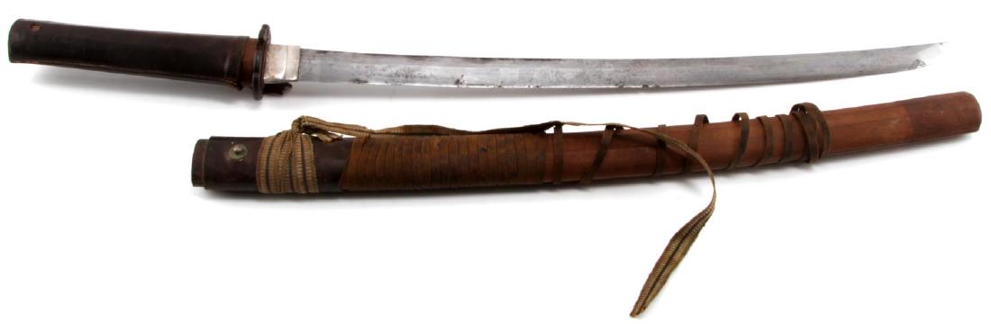 JAPANESE SIGNED SHINTO WAKIZASHI SAMURAI SWORD: This is a very old Wakizashi sword that is signed on its tang with Japanese characters and has a WWII officer's knot (likely added later). Sword also has a rare silver Habaki (blade collar) and emboss