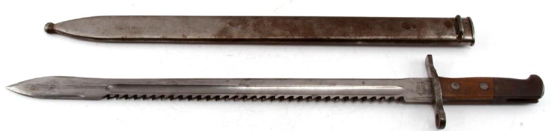 SWISS M1914 PIONEER SAWBACK BUTCHER BAYONET: This is a large Swiss sawback bayonet measuring nearly 24" in total with a 18.75" blade. It was made for use on the 7.5 mm. Schmidt-Rubin M1911 carbine and M1931 Short Rifle (K31). It is maker marked 