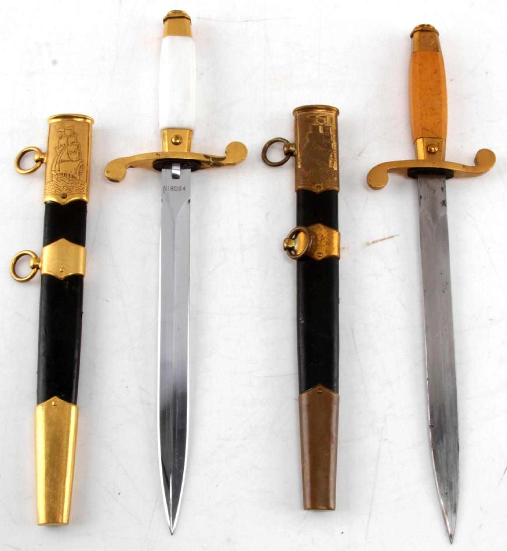 SOVIET COLD WAR NAVAL DRESS DAGGER LOT OF 2: This lot includes 2 Soviet cold-war dress daggers. 1 is year marked 1954 and is marked "NI8094" on the riposte. 1 dagger is not age stamped but is marked "N00660" Both daggers have matching leather an