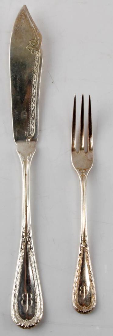 WWII EVA BRAUN THIRD REICH HALLMARK 800 SILVERWARE: WWII era Eva Braun Third Reich silverware set. One fork 5.5 inches and one fish knife 8.25 inches with floriated border pattern. Marked with the Eva Braun butterfly. 800 silver. Posen maker's mark. SV