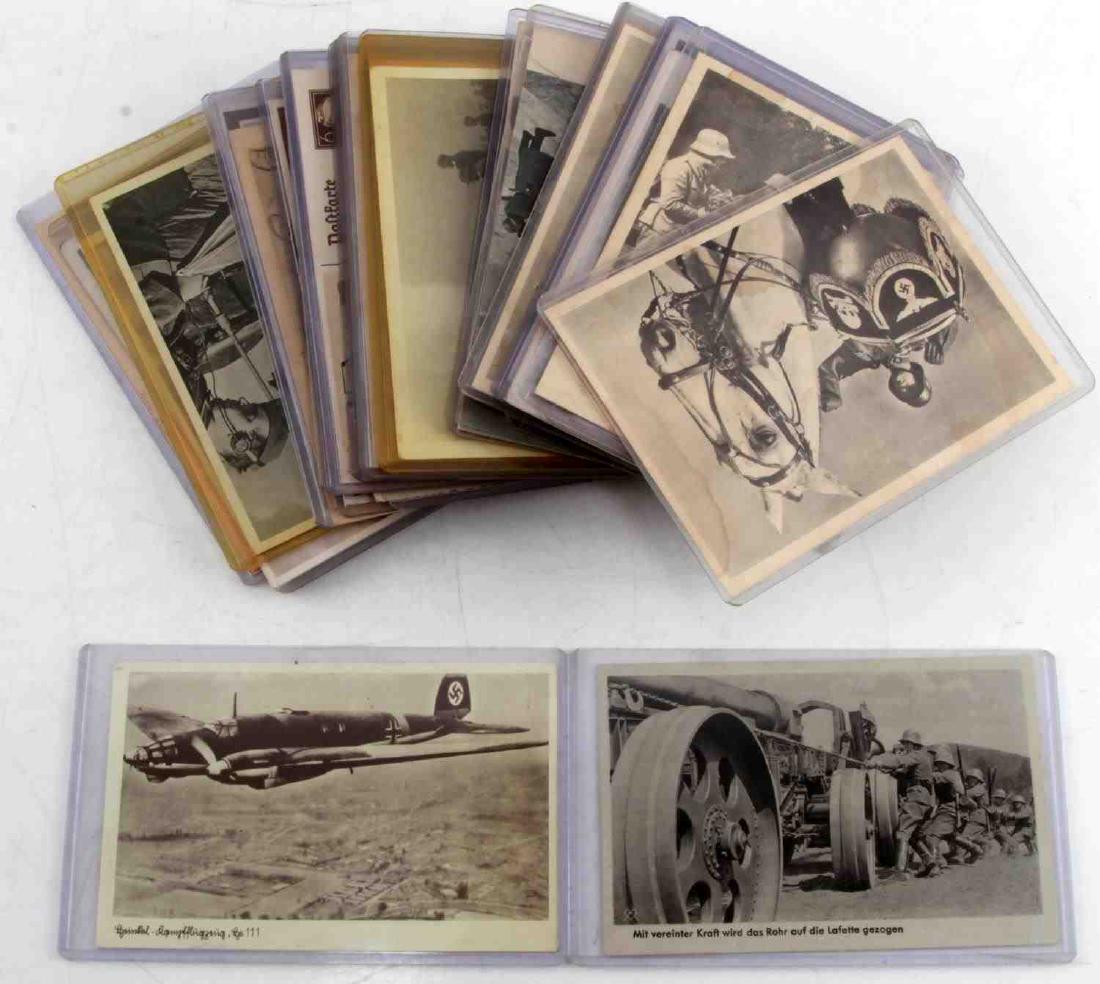 WWII GERMAN THIRD REICH POST CARD LOT OF 36: This lot contains 36 WWII German post cards featuring a variety of pictures and themes from political rallies, political figures, Wehrmacht military photos, Luftwaffe military photos, artistic renditi