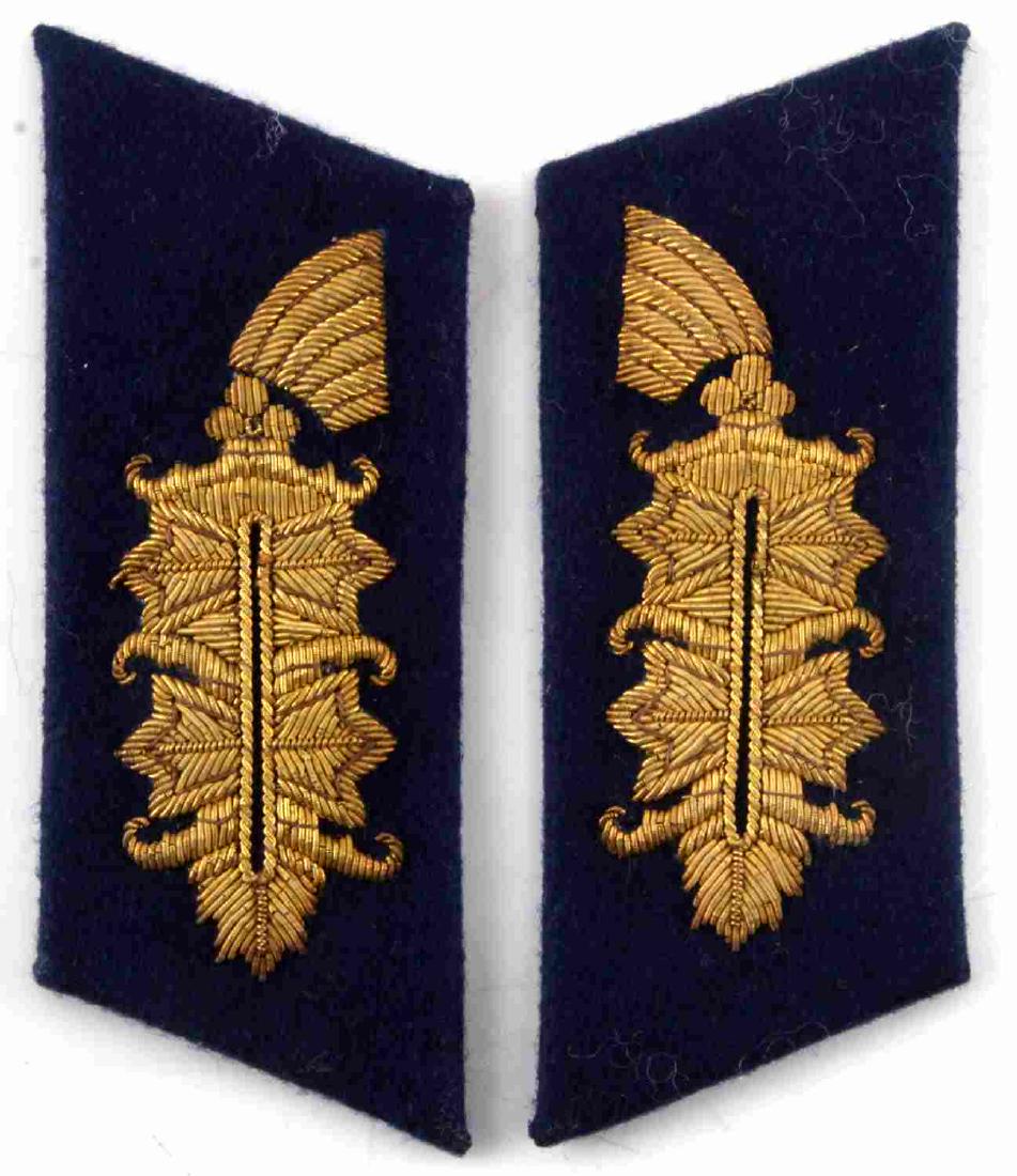 WWII GERMAN NSDAP KRIEGSMARINE ADMIRAL COLLAR TABS: WWII German Third Reich NSDAP Naval Kriegsmarine Admiral's pair of collar tabs with blue wool adorned with intricate and tightly woven Admiral's ranking insignia in gold-bullion wire. Items each measu