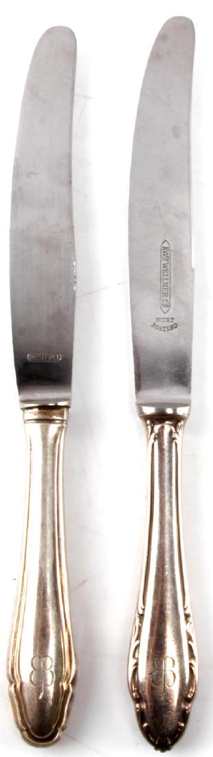 WWII EVA BRAUN THIRD REICH HALLMARK 800 SILVERWARE: WWII era Eva Braun Third Reich silverware set. Two knives. Measure 9.75 inches each. Marked with the Eva Braun butterfly. Hallmark 800 silver. Rostfrei maker's mark. SV2.
