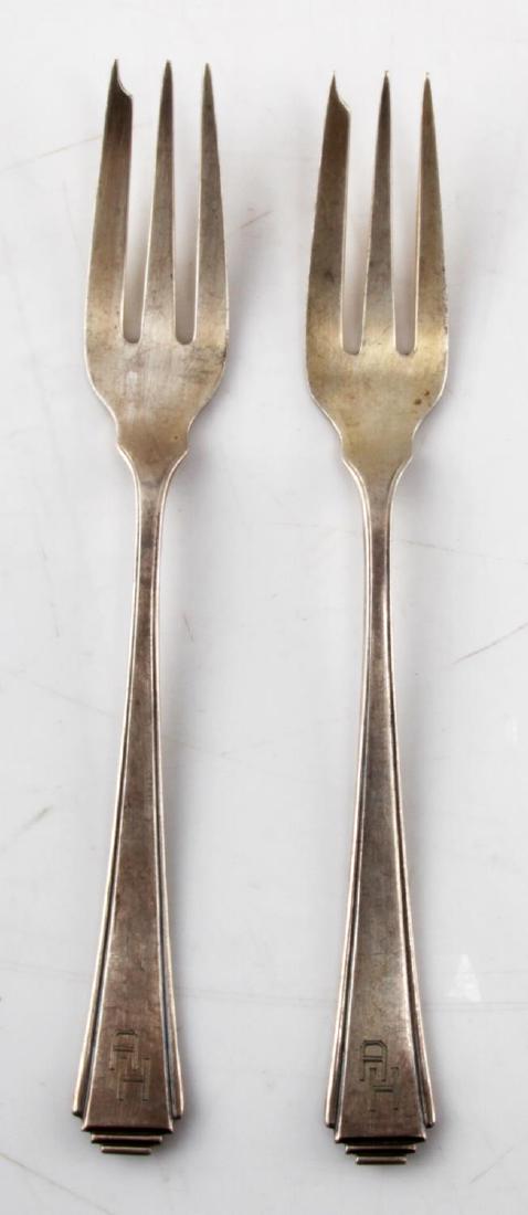 WWII HITLER THIRD REICH HALLMARK 800 FLATWARE: WWII era Adolf Hitler Third Reich silverware set. Two forks measuring 6 inches. Marked with AH insignia. 800 silver. German hallmark. SV2.
