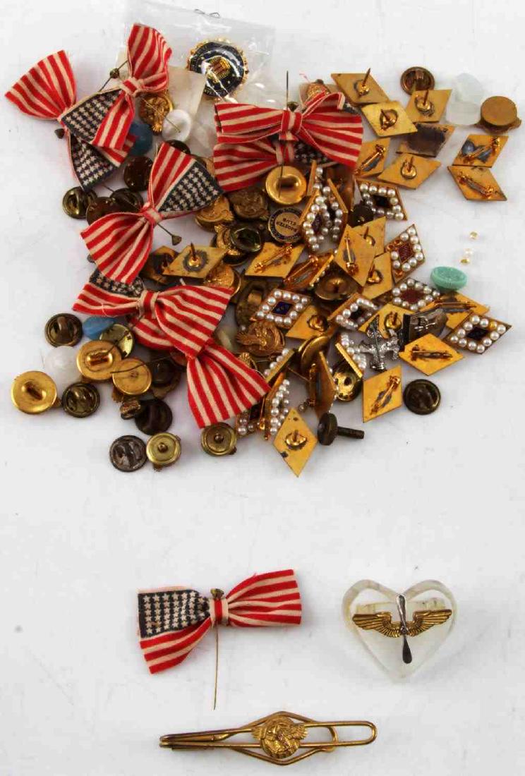MIXED LOT OF US MILITARY PINS RUPTURED DUCK WINGS: Lot contains: USN lapel pins with small pearls around, ruptured duck pins, wings, American bows and more. C86, NMRM59