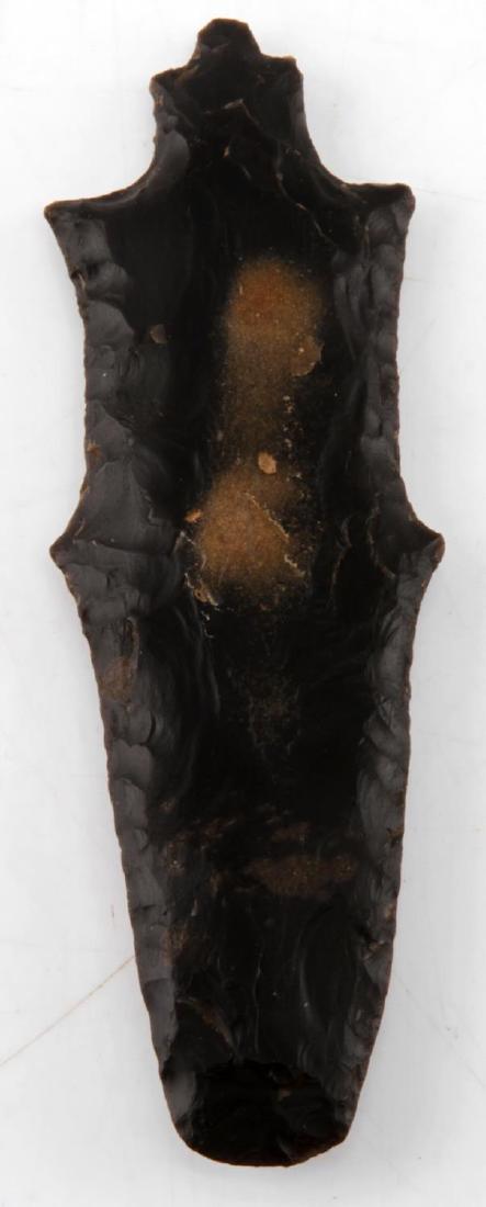 SUN TEMPLE MOUND KY 1921 ECENTRIC ARROWHEAD: Has sticker which reads "Sun Mound 1921 W.E. Myer, eccentric black 4 inch flint lithic tool or point, free of repairs or detractions, however there seems to be a 1 inch strip of glue or epoxy reverse 