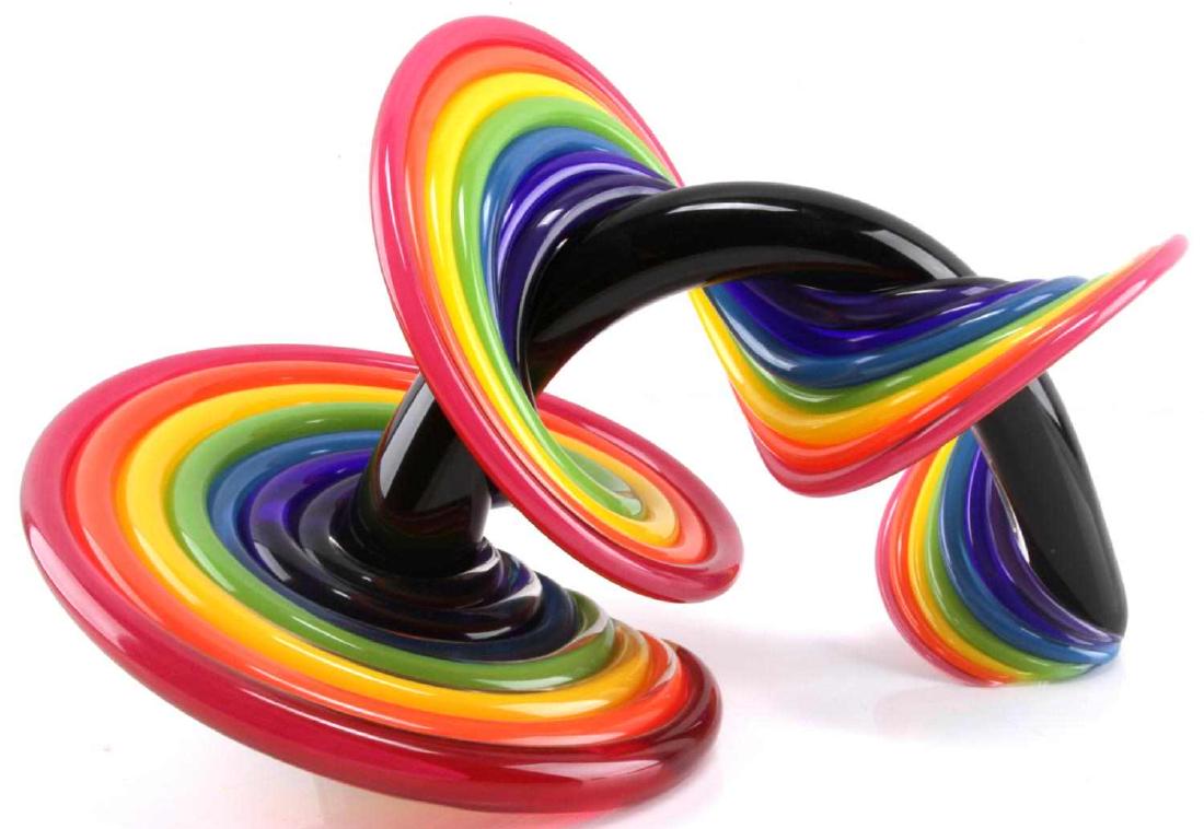 THOMAS KELLY VITRIX STUDIO RAINBOW HEECHEE FIGURE: A rainbow 'heechee' glass sculpture by artist Thomas Kelly. Measures 10 x 15 x 10.