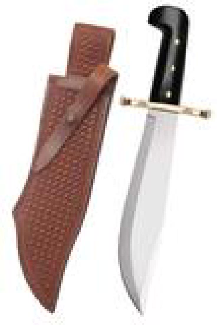 CASE XX BOWIE BLACK SYNTHETIC KNIFE & SHEATH: Case Bowie knife with a black synthetic handle and leather sheath. New in box. Photos are stock. This lot has a reserve.