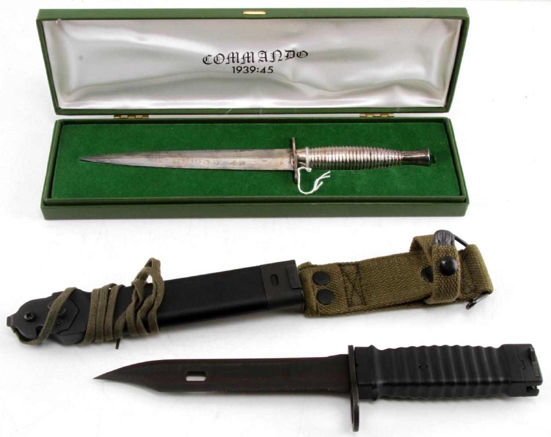 WWII SYKES & GARAND COMMEMORATIVE KNIFE LOT OF 2: This lot includes 1 Fairbairn Sykes commemorative 1939-45 Commando knife with Venture mark on the riposte and 1 reproduction M1 Garand bayonet. Fairbairn Sykes knife comes with case and is in very goo